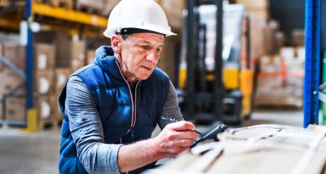 portrait-of-a-senior-male-warehouse-worker-or-a-su-F59H23T.jpg